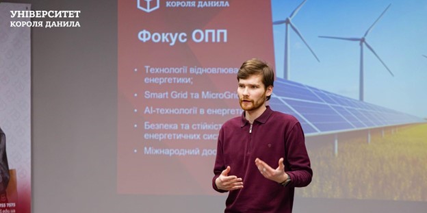 Nazarii-Andrii (one of the Ukrainian partners) is presenting the topic for the attendees in the room.