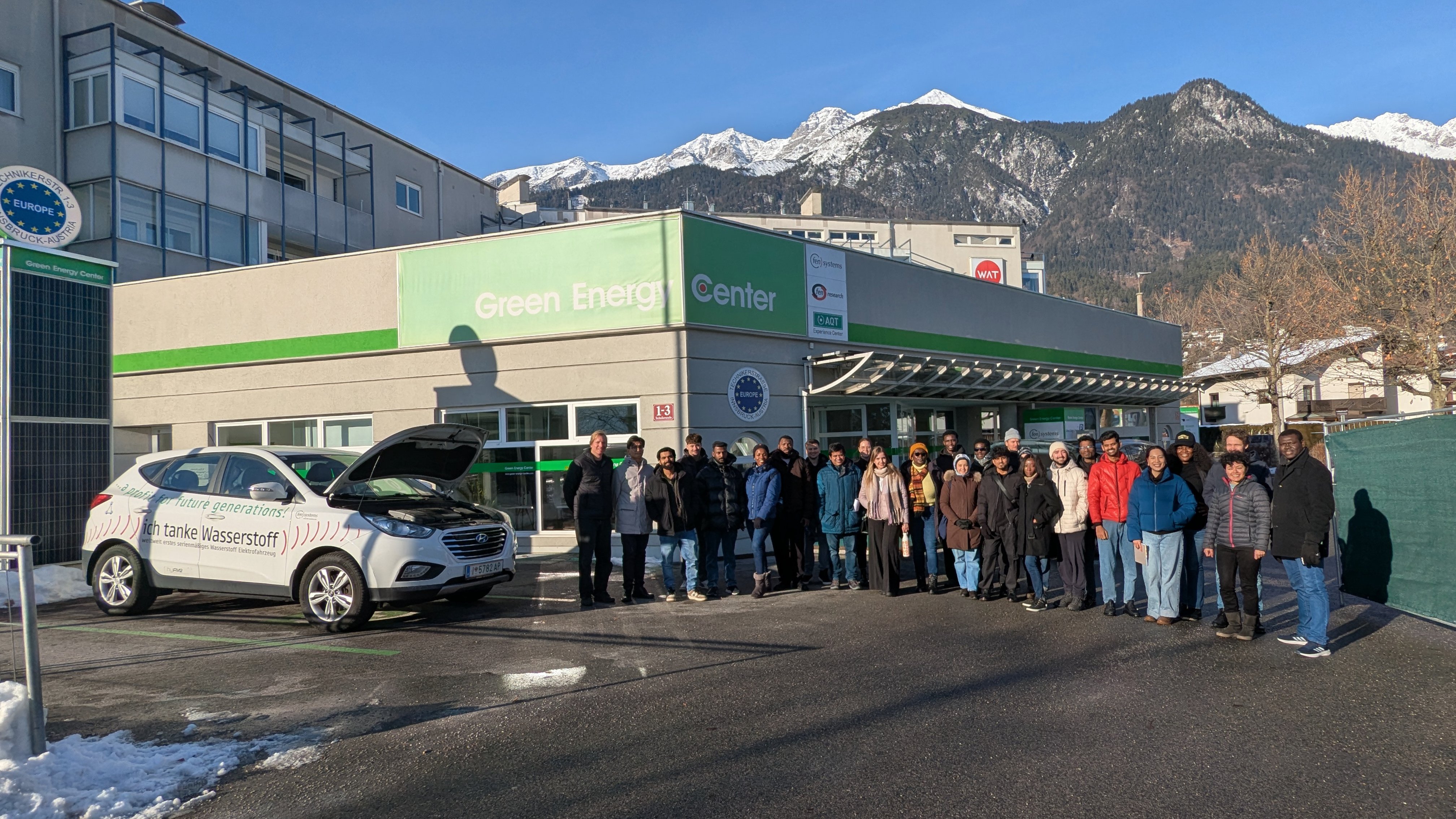 A Group of FH Kufstein Students standing in front of Green Energy Center