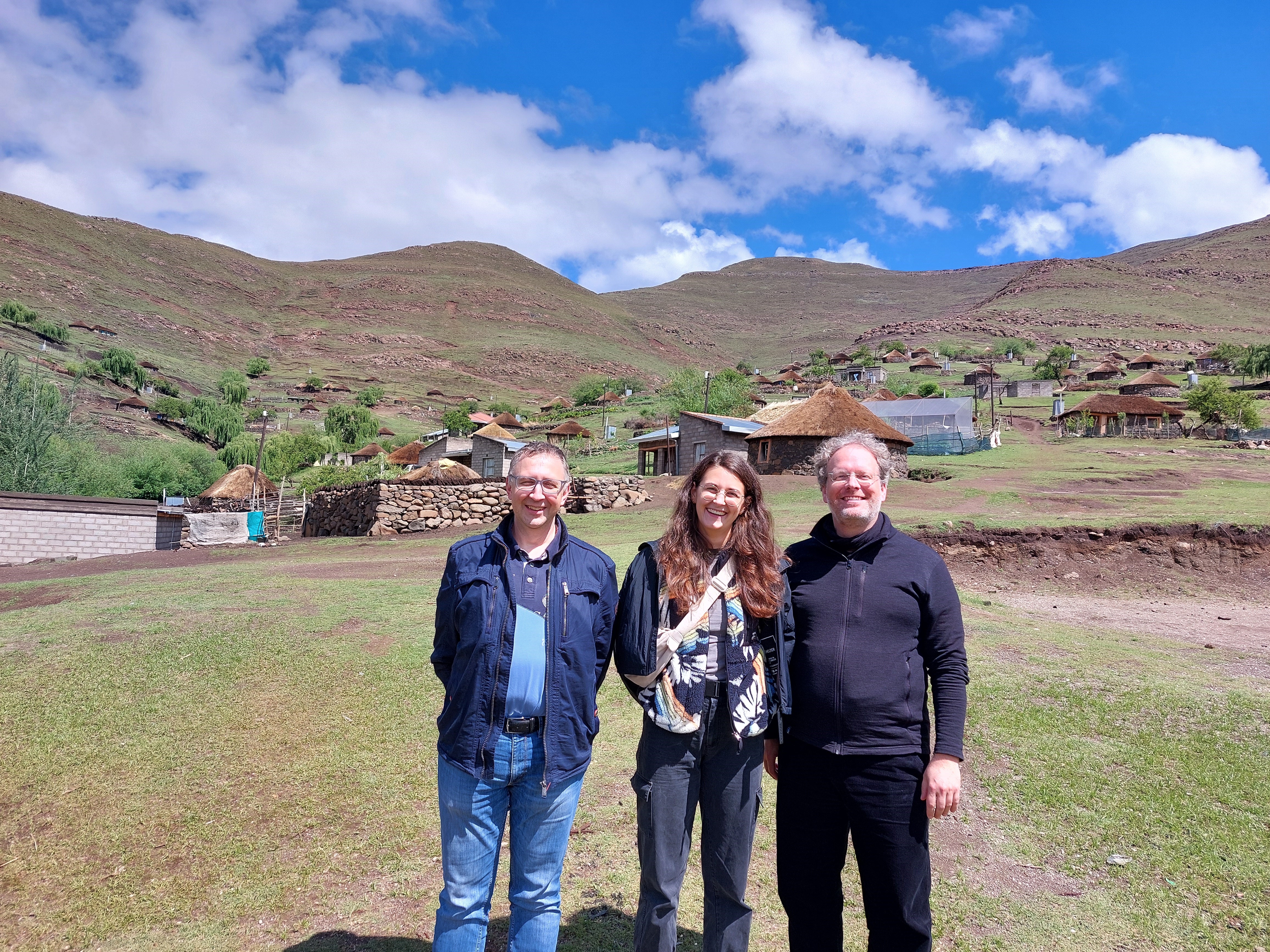 The image shows the team from FH Kufstein in the mountain village of Motete where the mini-grid system supplies the community with electricity.